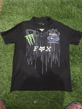 Fox Black Polo with Neon Green Monster Tag